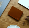 A beautiful and stylish bi-fold wallet that sorts your notes and coins like magic