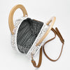 Wicker beach bag with wooden handles